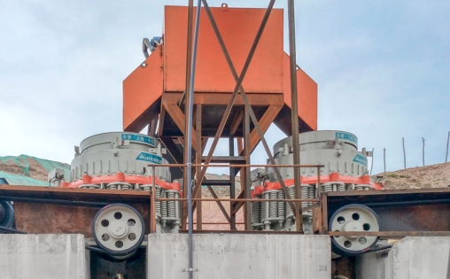 What is included in a cone crusher specification table?